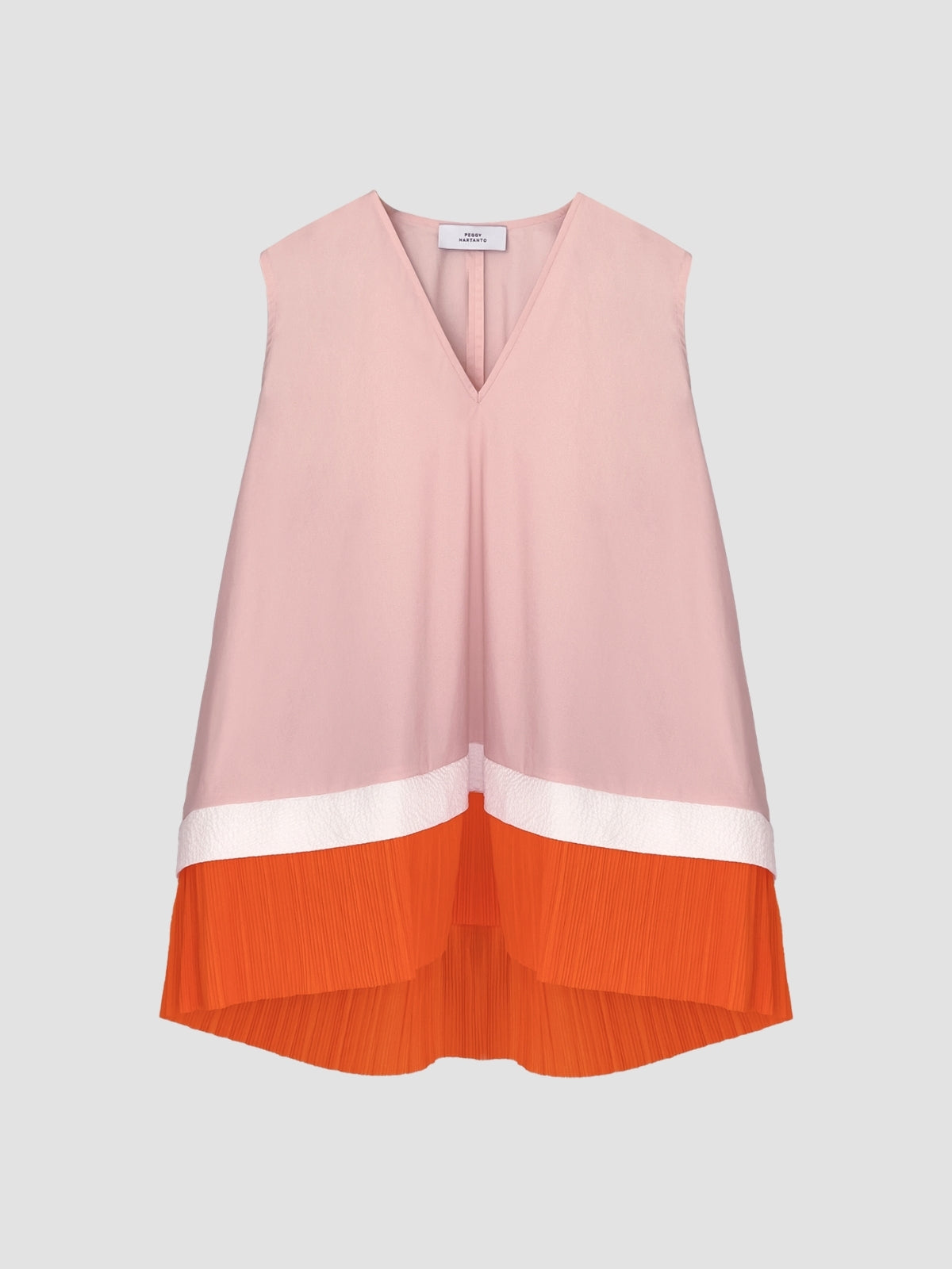 Coral pink Mikoshi blouse with orange pleats