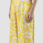Yellow Flo long pants with swirl pattern