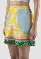 Yellow Edna shorts with swirl pattern