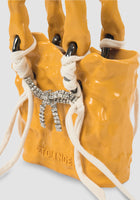 Yellow signature ceramic bag