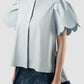 Sky blue Biennis shirt with scalloped short sleeves