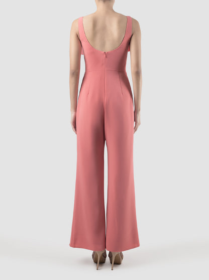 Octave coral jumpsuit with scalloped bow and cutout