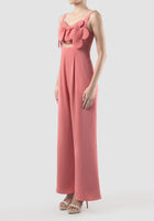 Octave coral jumpsuit with scalloped bow and cutout