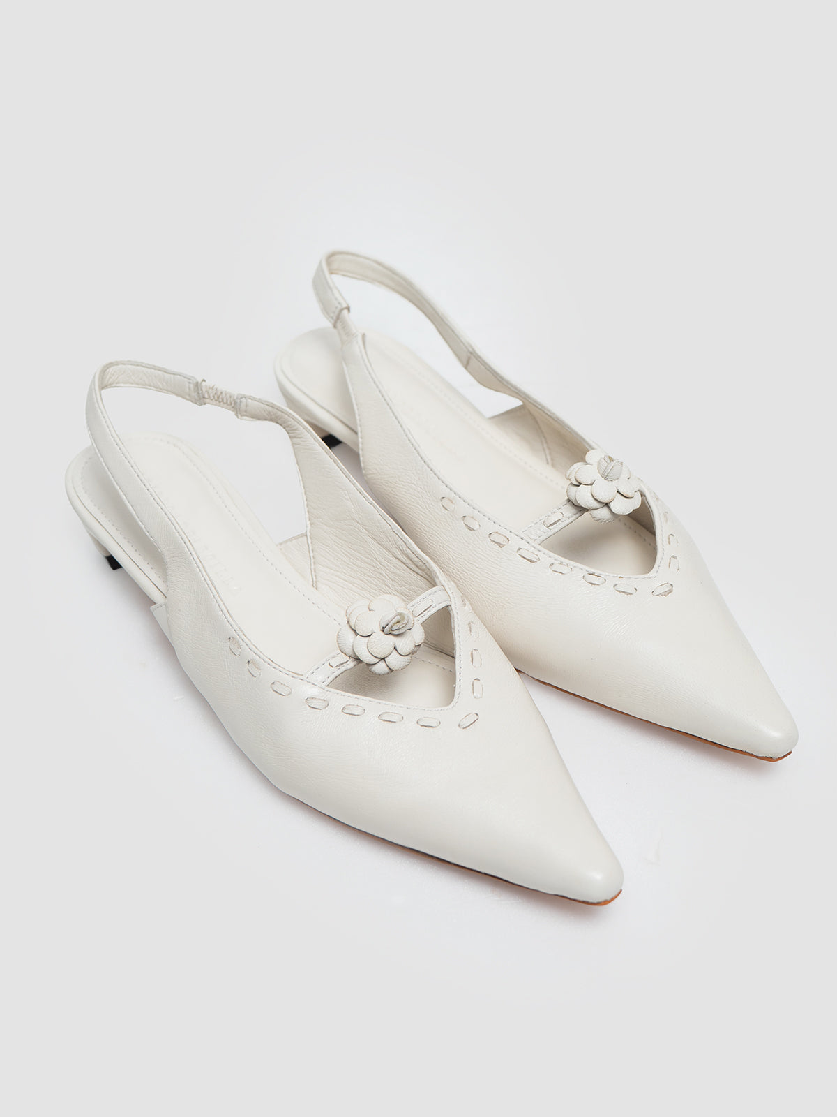 White Valencia Pumps