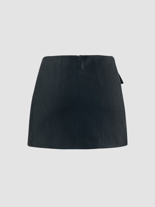 Black denim mini skirt with distressed details