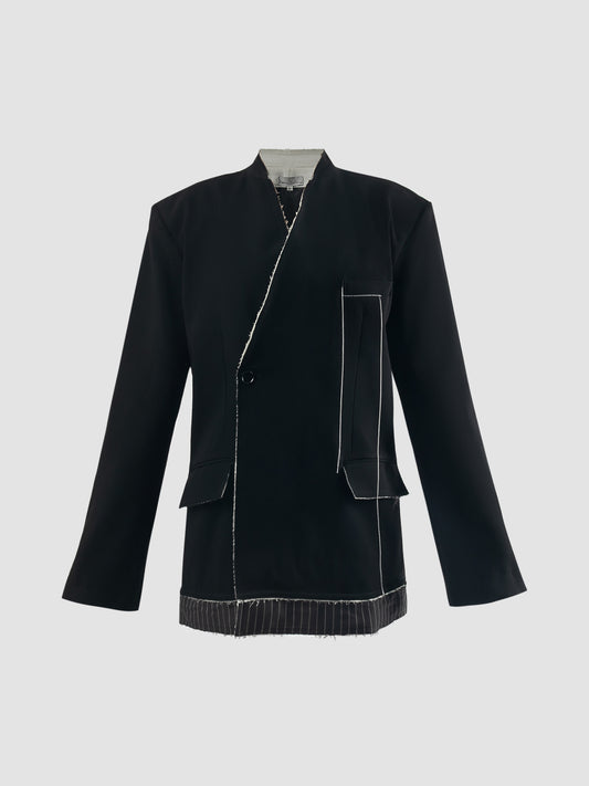 Black double-breasted suit with pinstripe hemline