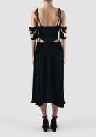 Black corset dress with cutout details and embroidered sleeves