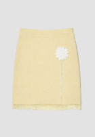 Yellow knit mini skirt with sun crochet applique