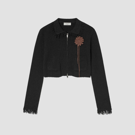 Black knit cropped jacket with sun crochet appliqué