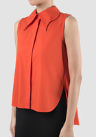 Oval burnt orange sleeveless shirt