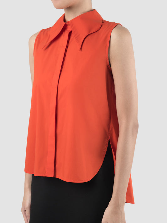 Oval burnt orange sleeveless shirt
