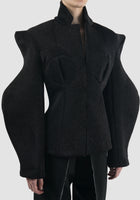 Black tailored neoprene suit with abstract long sleeves