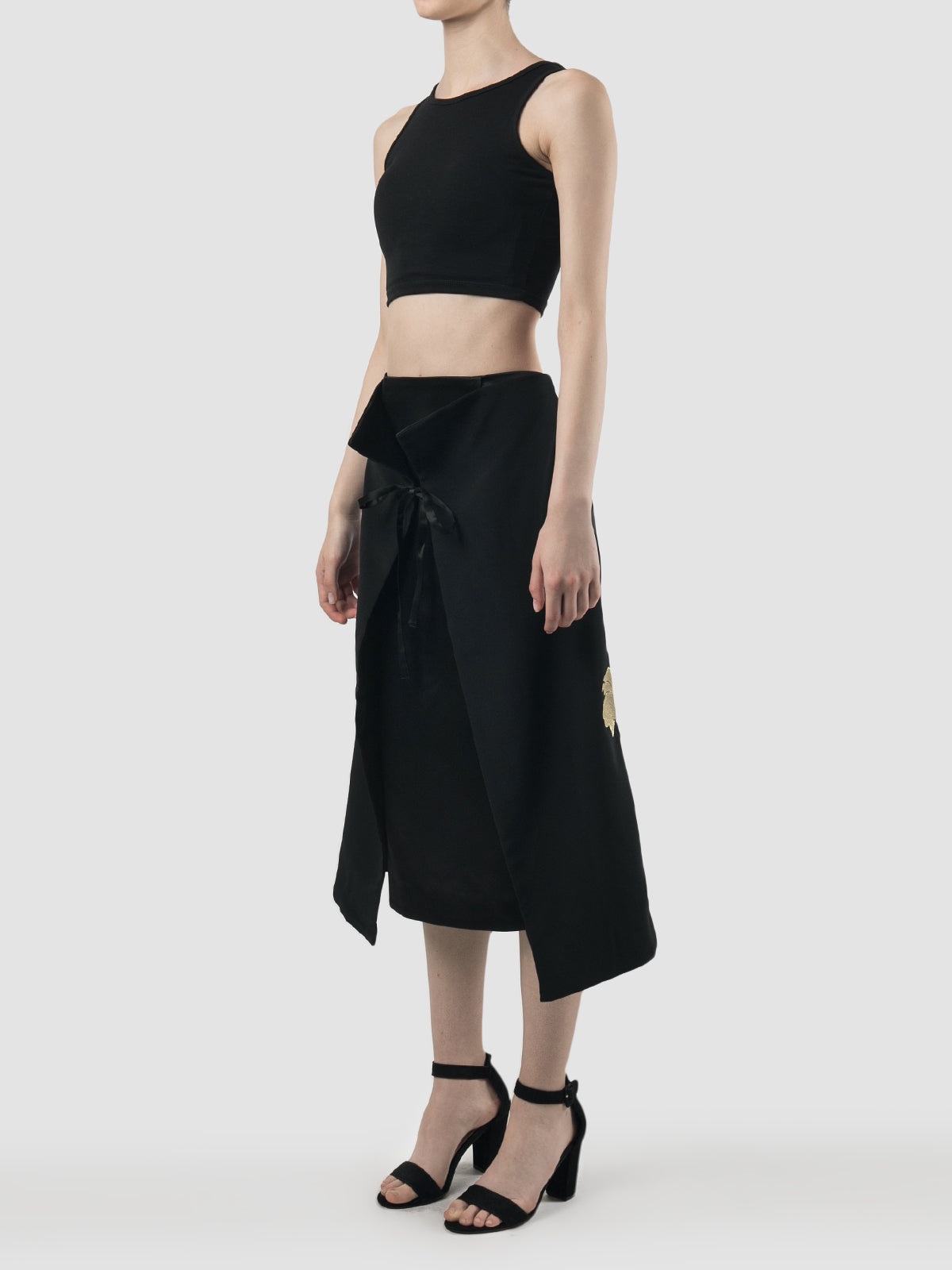 Black double-layered skirt with gold embroidery