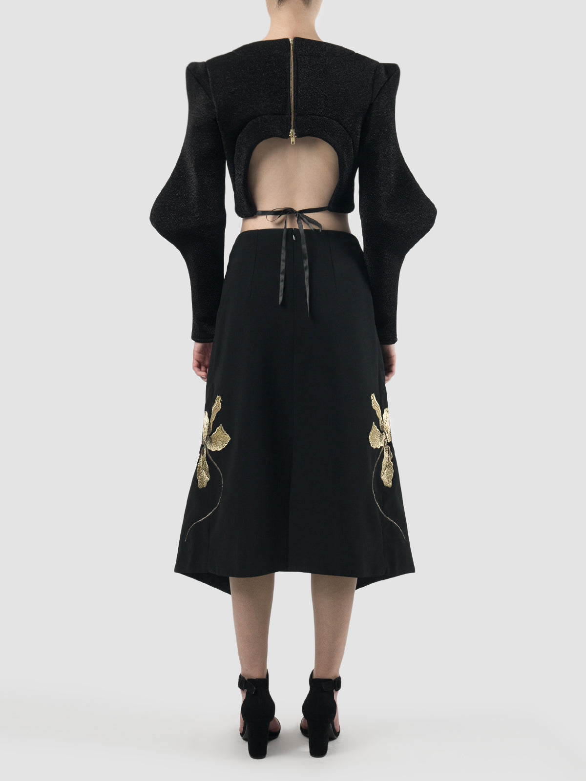 Black neoprene cropped top with abstract long sleeves