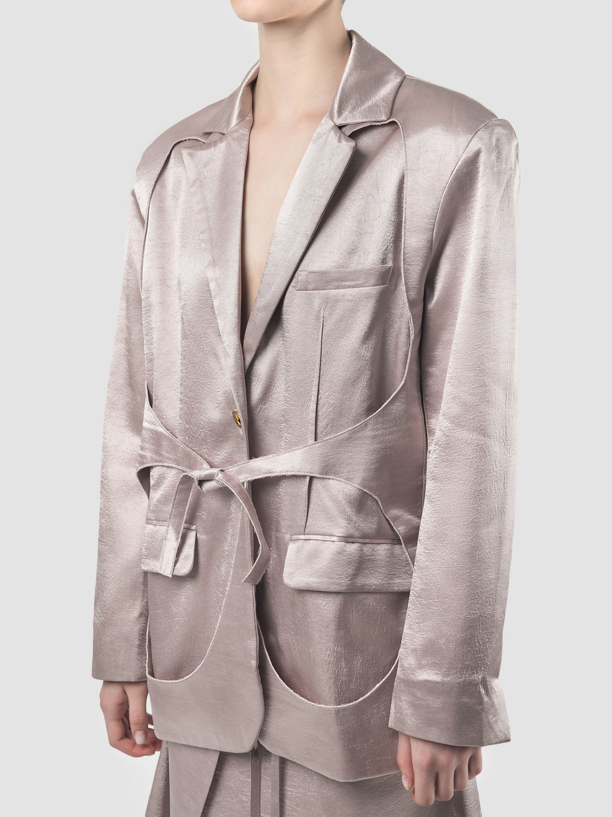 Lilac tailored suit with unfinished layered details