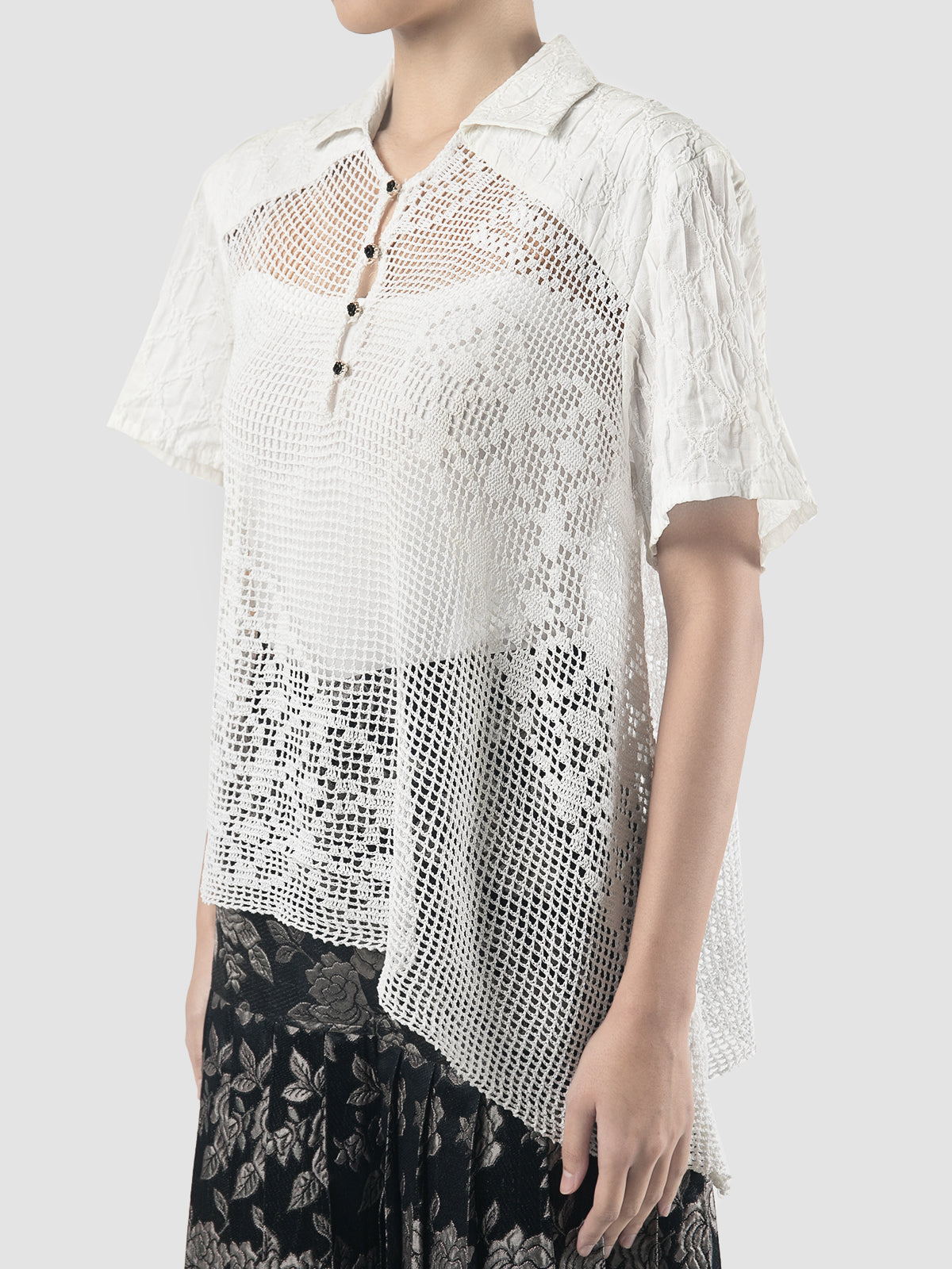 Diagonal white translucent polo shirt